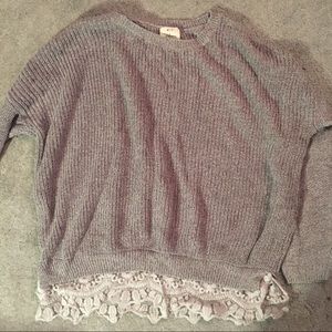 sweater with lace on the bottom